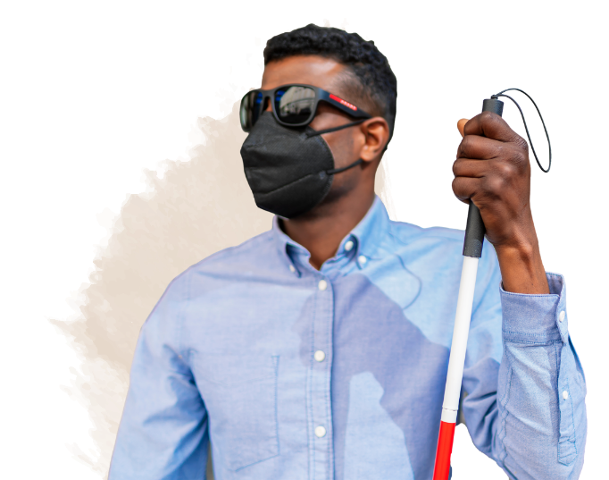 Man with a white stick and glasses